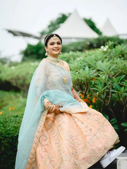 A bride in a lehenga and Nike sneakers. I love it. Disha's choice of footwear was a fun and personal touch that showed her personality.