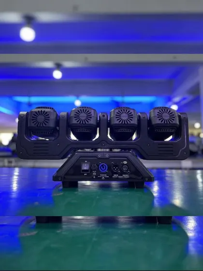 A close-up of the Beam 4 Infinite Stage Light. This fixture has four independently moving heads on one bar, allowing me to create complex, synchronized movements from a single unit.
