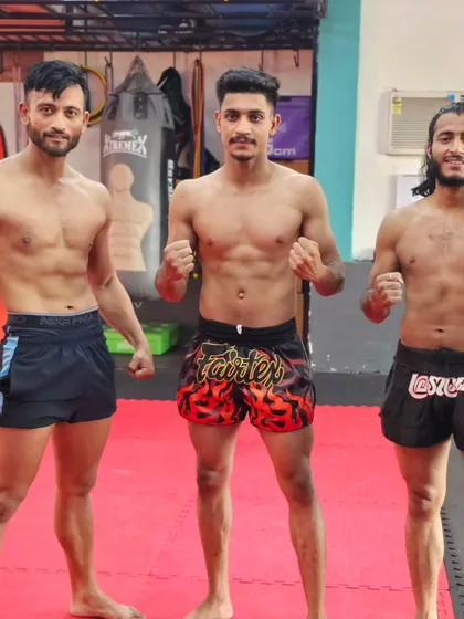 Three of our dedicated fighters after a tough session. The results of hard work and discipline are clear.