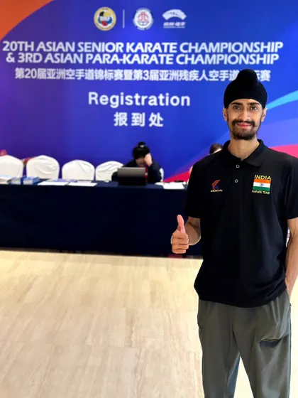 At the registration desk for the 20th Asian Senior Karate Championship. The journey begins here.