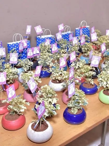 Thoughtful return gifts for a 'Star and Moon' themed party. I arranged these small potted plants with custom tags to thank the guests for coming.