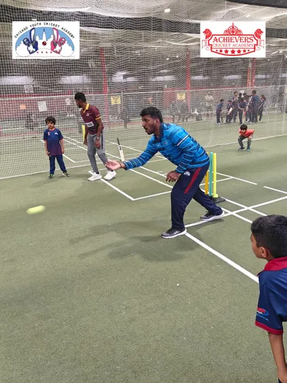 Coach Prashant demonstrating a bowling drill at the indoor nets in Chicago. Our partnership ensures that players in the US get access to the same technical expertise as our players in Mumbai.