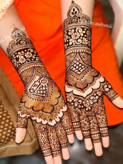 A classic design with a modern twist, featuring a personalized bottle motif for a client during our Eid Mela.