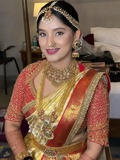 This portrait shot shows the bride's complete look, including her traditional head jewelry. You'll learn how to apply makeup that works with all the elements of a bride's attire.