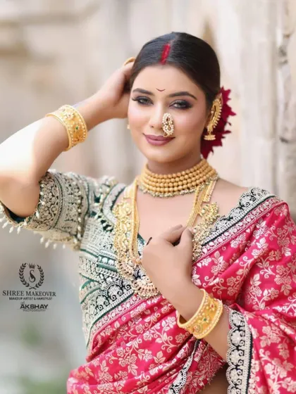A close-up of the model in the pink Navvari saree, highlighting the beautiful makeup and intricate jewellery.