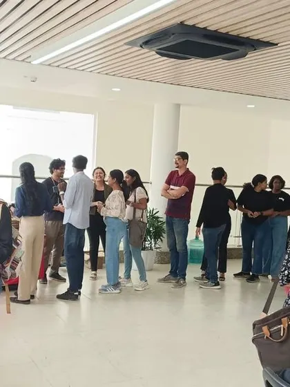 Students and faculty enjoying our buffet service during a college event at RV University. We can cater to large groups in any institutional setting.