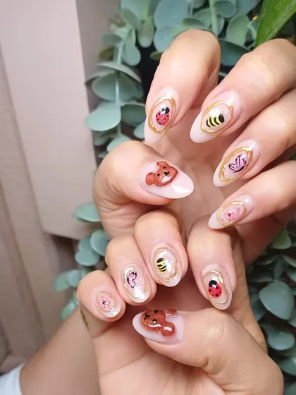 This version includes a cute 3D teddy bear alongside the hand-painted insects, showing how we can mix techniques for a custom look.