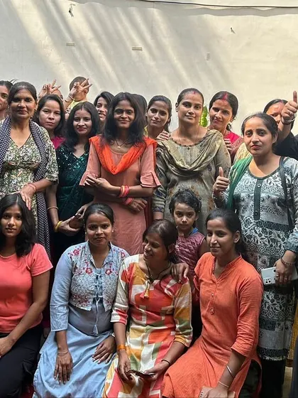 Our team and student volunteers at a recent NGO event. We believe in giving back to the community and providing opportunities for our students to use their skills for a good cause.