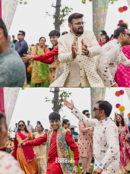Guests enjoying the dance floor at a Mehendi or Sangeet. These candid shots show the collective joy of the celebration.