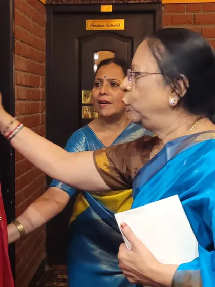 Receiving blessings and good wishes from a senior rasika after my performance at Krishna Gana Sabha. The appreciation of the audience is the ultimate reward.