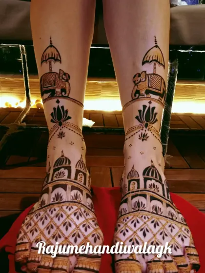 This unique foot design features elephants with royal umbrellas (chhatris) on the legs, and architectural patterns on the feet.