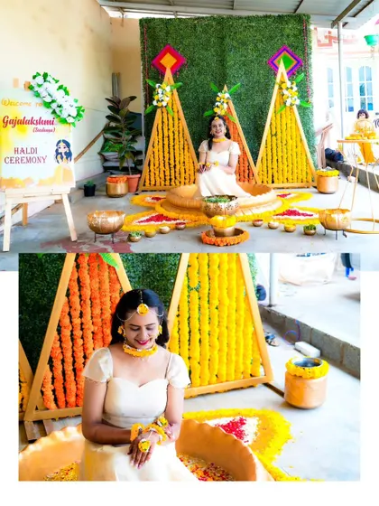 A full view of the Haldi ceremony setup, with the bride seated amidst beautiful floral decorations.