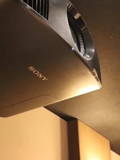 A close-up of a high-end Sony 4K projector, known for its exceptional picture quality, contrast, and color accuracy. I select the best projector for each unique project.