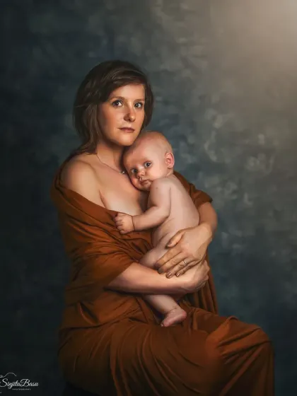 This painterly portrait of a mother nursing her baby is a tribute to the beautiful, intimate bond of early motherhood. It's a quiet, powerful moment that I was honored to document.
