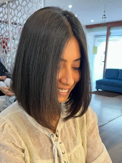 Aishwarya looking radiant with her new sharp bob.