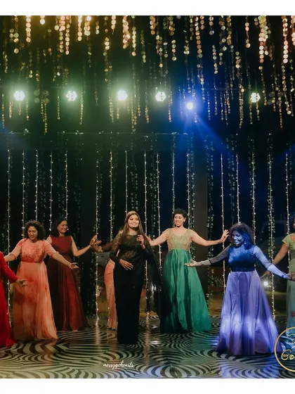 A beautifully choreographed dance performance by the bridesmaids at a Sangeet night.