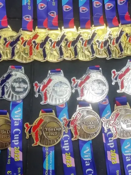 A display of the Gold, Silver, and Bronze medals won by our students at the VIFA Cup 2023. We are proud of every single athlete's performance.