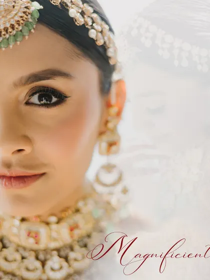 Magnificent. A close-up, artistic portrait of the bride, with a soft, ghosted image of her in the background, adding a layer of depth and emotion.