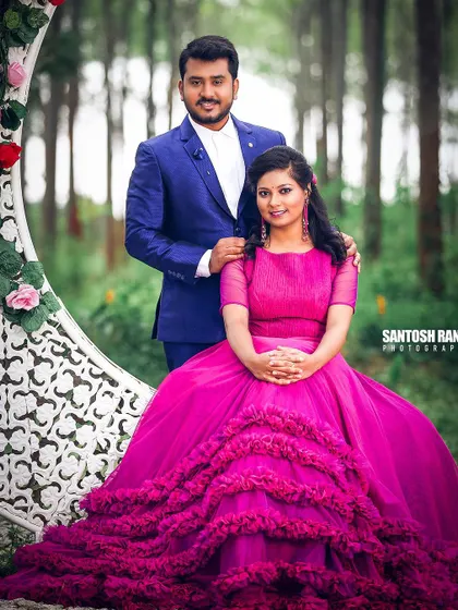 A vibrant and colorful portrait of a couple, with the bride's gown making a bold statement.