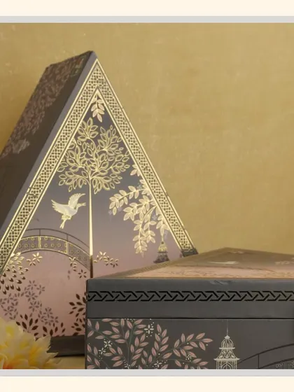 A close-up of the unique triangular design of the "Grey Delight" hamper box, showcasing its modern and artistic appeal.