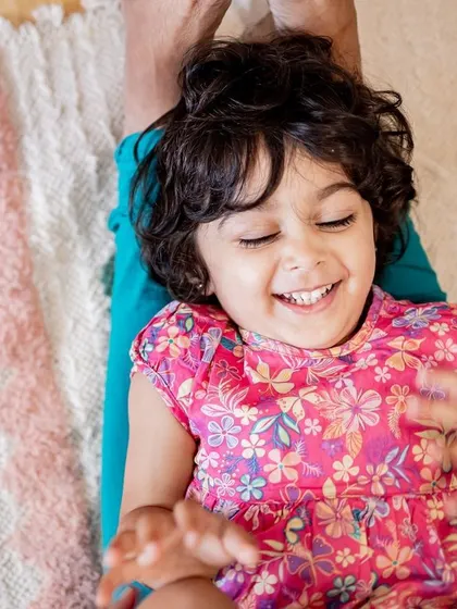The pure joy of playing in a circus tent. I love capturing the uninhibited laughter and imagination of toddlers during our sessions.