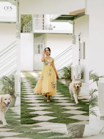 A bride's grand entrance with her furry friends. This heartwarming and unique shot from a Haldi ceremony shows that we are ready to capture all the special members of your family.