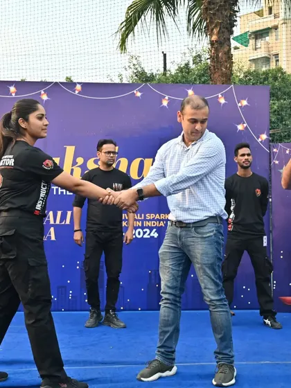 One of my female instructors demonstrates a wrist lock on a volunteer from the audience. This shows the effectiveness of our techniques when applied by a trained individual, regardless of gender.