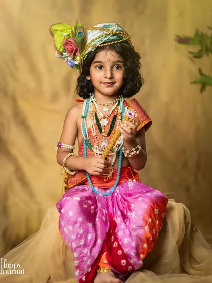 A duplicate of image 32, a stunning portrait of a girl dressed as the divine and playful Lord Krishna.