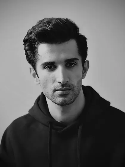 A direct portrait of Sidhant Gupta, showcasing a classic, clean men's style.