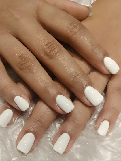 You can never go wrong with a crisp, opaque white manicure. This look is fresh, bold, and perfect for making your nails pop.