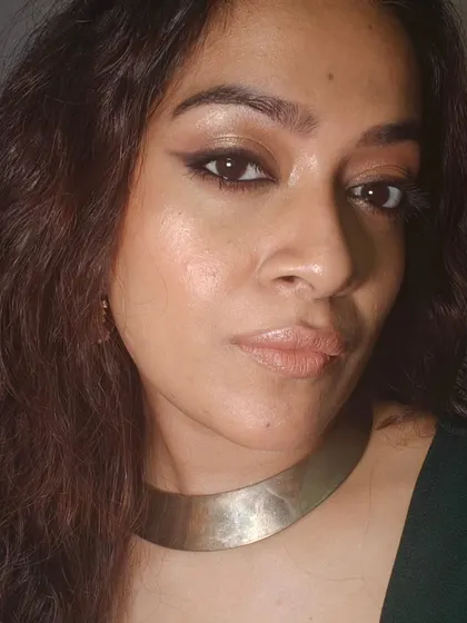 Another shot of my Christmas makeup. The soft, diffused eyeliner and glossy nude lip create a look that is festive yet sophisticated.
