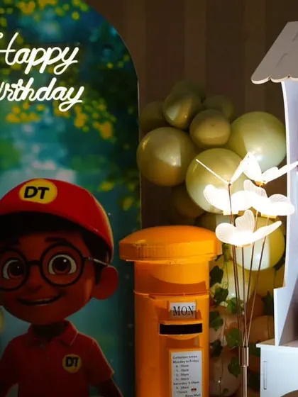 A close-up of the favor station. Even the return gifts are presented in a way that enhances the theme, with a custom-designed cart and themed packaging.