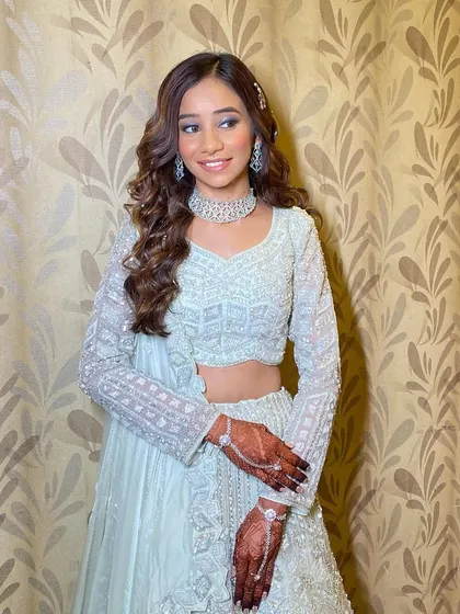 A radiant and happy bride. This look is all about that lit-from-within glow, achieved with careful skin prep and layering of luminous products from my luxury kit.