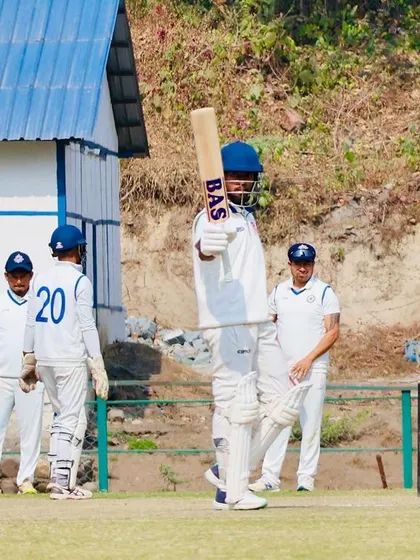 A batsman holds his pose after a classic cover drive.