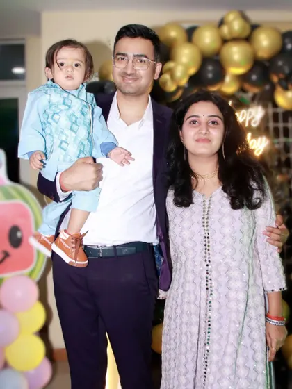A family portrait at a Cocomelon-themed birthday party in Noida. We have experience with all the popular kids' party themes and know how to photograph them well.