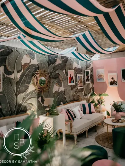 Another angle of the "Hotel California" lounge, showing the iconic Martinique wallpaper and the mix of modern and vintage furniture that brought the theme to life.