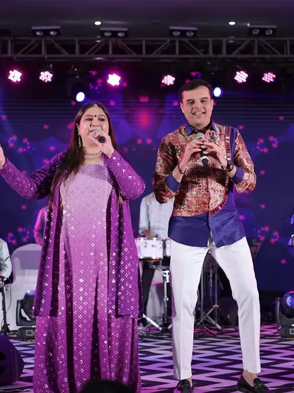 A live performance by singers on stage, keeping the energy high at the Sangeet. I work with a wide network of talented artists to suit any musical taste.