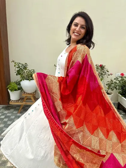 A duplicate image showing a happy twirl in my new dupatta.