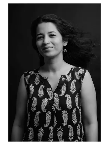 A duplicate of the previous image, this thoughtful black and white portrait captures a quiet and confident moment.