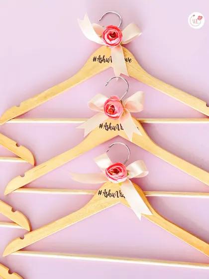 Another custom hanger design, this time with a delicate pink rose and ribbon. These are perfect for those beautiful "getting ready" photos of the wedding outfits.