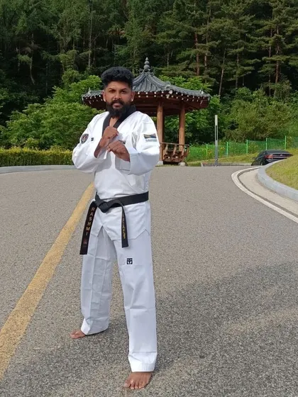 A moment of focus on a road near the Taekwondowon.