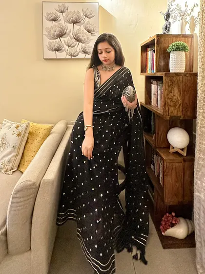 The full look, showing how the saree drapes beautifully. This is a great example of a wedding guest outfit that is both stylish and easy to manage.