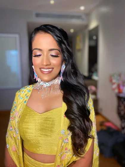A close-up of the glowing, natural-looking makeup, perfect for a daytime Haldi event.