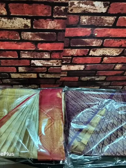 Another view of the packed sarees. This compact folding is perfect for travel, as it takes up very little space in your luggage.