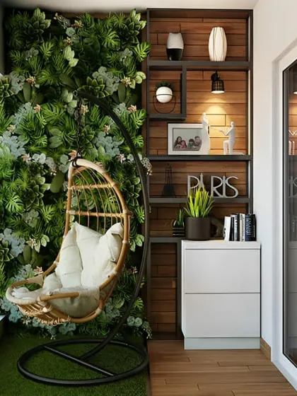 Even a small balcony can become a green oasis. This design combines a space-saving swing chair with a dense artificial vertical garden, providing maximum impact with a minimal footprint.