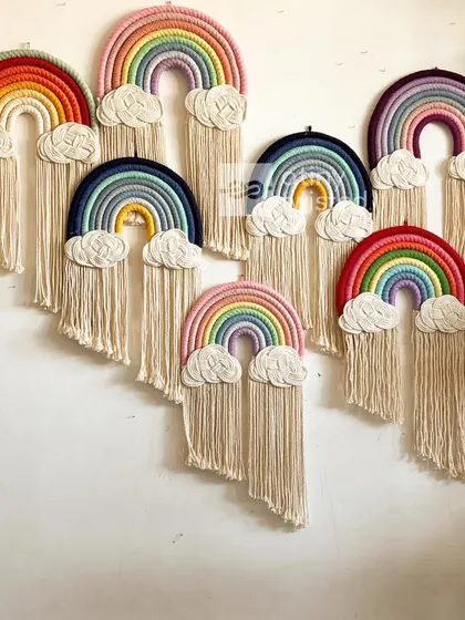 A whole wall of rainbows! Each one has its own personality and color story. These are perfect for kids' rooms, playrooms, or as a cheerful gift.