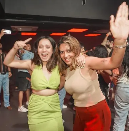 Guests posing and having fun at Toca.