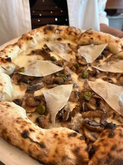 Our Funghi e Capperi Pizza, a white pizza with earthy mushrooms and briny capers.