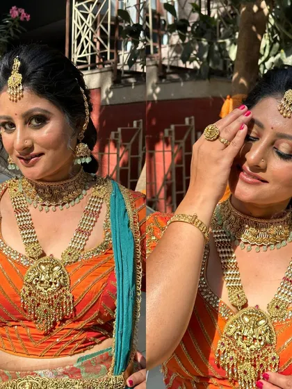 A complete HD makeup look on a model in a vibrant orange and blue lehenga, demonstrating the flawless finish students learn to achieve.