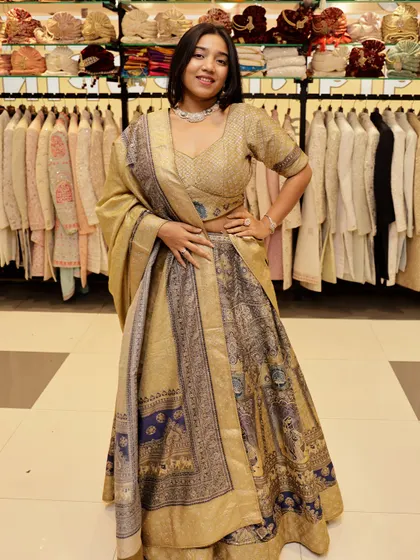 A confident pose in this unique printed lehenga, perfect for a wedding guest who wants to stand out.